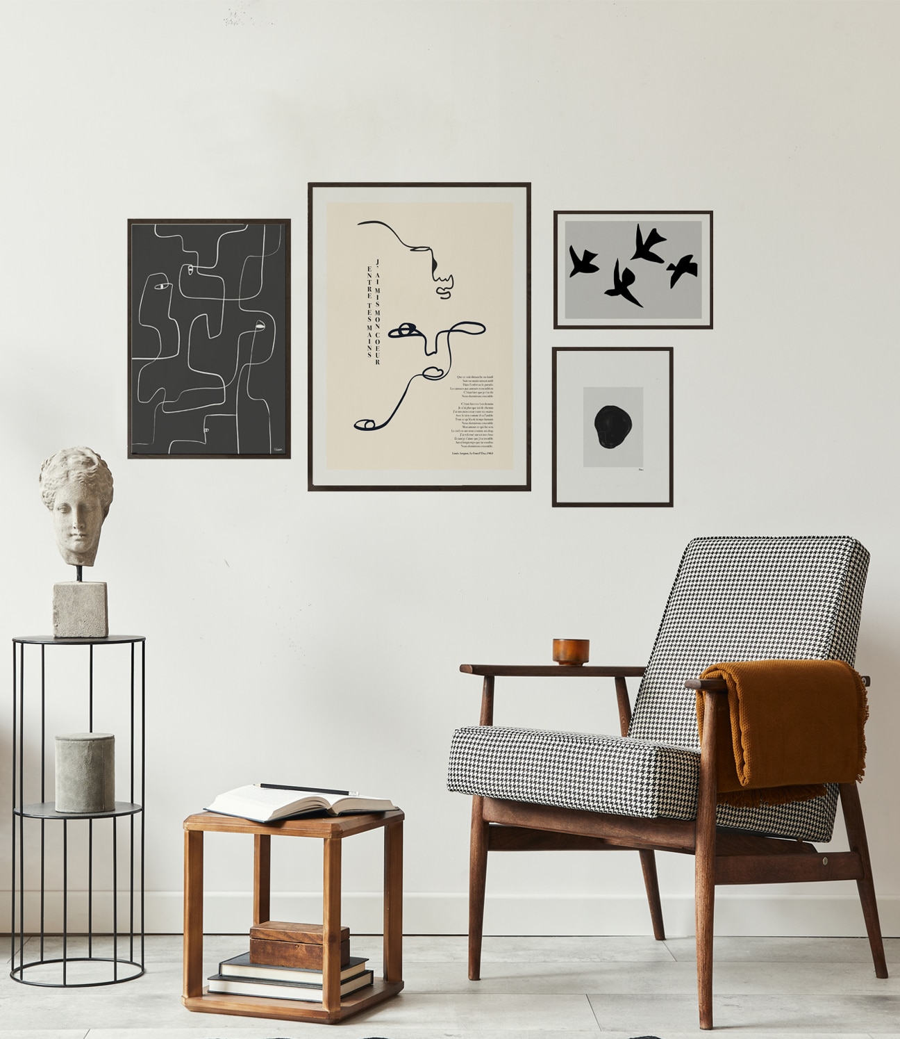 A Gallery Wall constructed with select statement pieces from our original in house collections, including poetry inspired line art and minimalism.